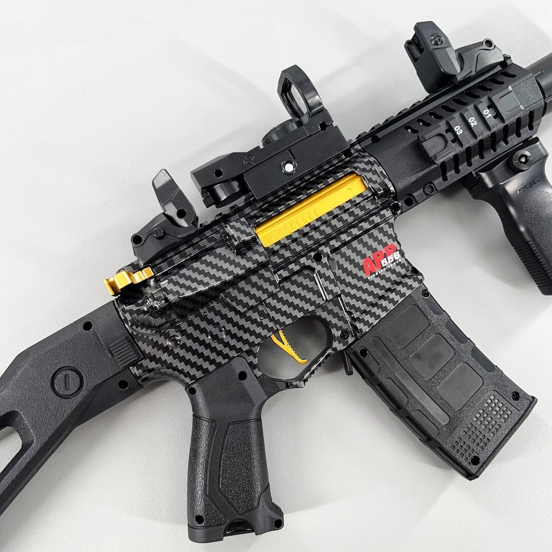 Carbon Fiber Gold Embellished ARP556 Gel Blaster